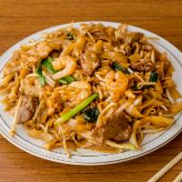 House Chow Fun · With shrimp, beef and chicken. With onions, scallions and bean sprouts.