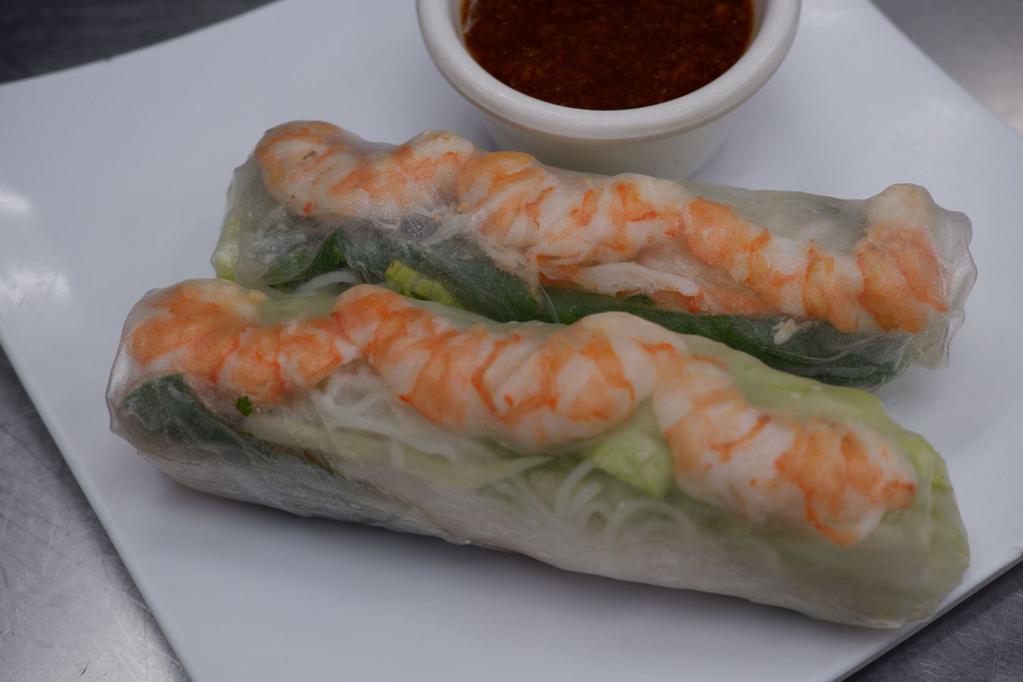 Spring Rolls (2 pc) · Soft rice paper wrapper with vermicelli noodles, lettuce, basil, carrot; peanut sauce.