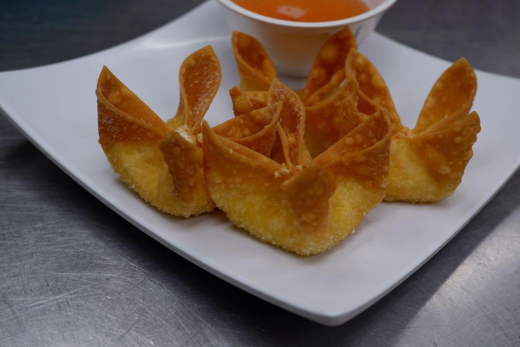 Crab Rangoons (4 pc) · Wonton wrapper, cream cheese, celery, green onions, imitation crab; sweet and sour sauce.