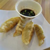 Pork Dumplings (4 pc) · Steam or fried stuffed with cabbage, green onions, wheat dough; sweet soy dipping sauce.