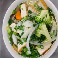 Vegetable Pho · 100% vegetable broth with tofu, broccoli, Napa cabbage, mushrooms, and carrots.