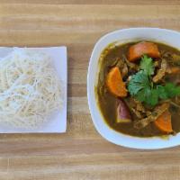 Southern Yellow Curry · Yellow curry from Southern Vietnam composed of turmeric spices, onions, garlic, carrots, pot...