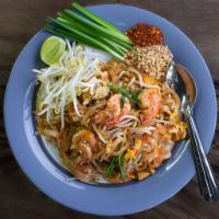 Pad Thai · Rice noodles stir-fried with bean sprouts, scallion, tofu, and egg in tamarind sauce. Served...