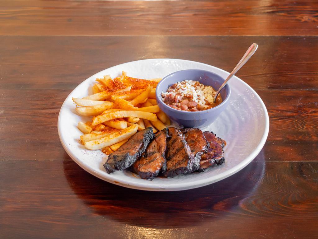 Chipotle BBQ Tri Tip · Thick sliced, flame-broiled tri-tip with chipotle BBQ glaze. Served with fries and house charro beans.