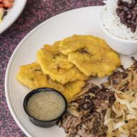 Vaca Frita · Flat iron grilled shredded beef+cooked onions