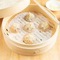 pork & dungeness crab xiao long bao · five (5) pieces of fresh dungeness crab and pork xiao long bao.  served with ginger and vine...