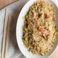 dungeness crab fried rice · fresh dungeness crab fried rice with garlic, egg and green onions.