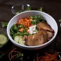 Rice Bowl *New Item* · Broken rice, lettuce, pickled carrots/daikon, green onions, cucumbers, cilantro, and served ...