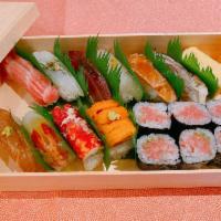 Omakase · 11 pieces & Negitoro or Torotaku cut roll, 
Daily Premium fish with Miso soup 
