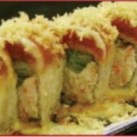 Red Dragon Roll · Base: crab meat, shrimp tempura, avocado and cucumber. Top: spicy tuna and crunch flakes. Sp...