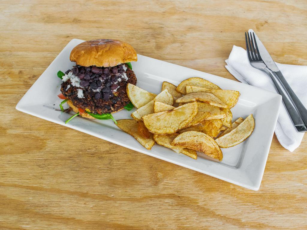 Vegan Burger · Vegan bread, black beans, cheese and vegan cheese. Served with mix greens and fresh cut wedges.