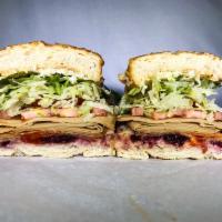 219. Pilgrim Sandwich · Vegan turkey, cranberry sauce, Sriracha and cheddar. Served with dirty sauce, lettuce and to...