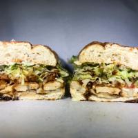 301. Handsome Owl Sandwich · Vegan chicken, teriyaki, wasabi mayo and Swiss. All sandwiches served with lettuce, tomato a...