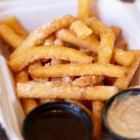 Funnel Cake Fries · All you love about Carnival Funnel cakes in french fry form, dusted with powdered sugar and ...