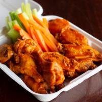 Bone-In or Boneless Wings - FM Style · 20 Pieces with your choice of one sauce. Served with carrot & celery sticks and your choice ...