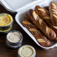Bavarian Pretzel Sticks - FM Style · 8 Pieces with whipped maple butter, creamy honey mustard & queso