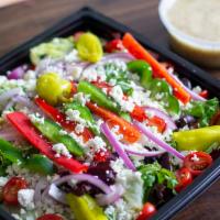 The Greek Salad - FM Style · Feta cheese, red onion, tomatoes, pepperoncini’s, kalamatas, peppers, garden greens, choice ...