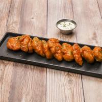 Boneless Chicken Wings · Served with bleu cheese and ranch with a choice of our 10 newest sauces: sweet honey mustard...