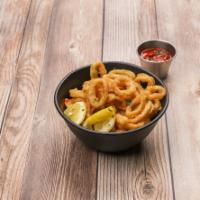 Fried Calamari · Lightly dusted and served with zesty tomato sauce.