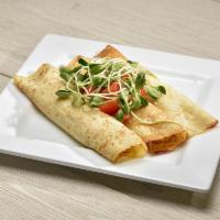 Grilled Chicken Crepes · Served with tomatoes and sprouts.