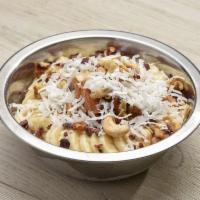 Protein Packed Bowl · Organic acai or dragon fruit topped with organic granola, banana, natural peanut butter, wal...