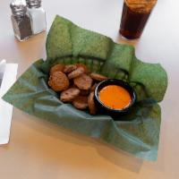 Pickle Chips · A shareable portion of fried pickle chips with boom boom sauce for dipping sauce purposes. I...