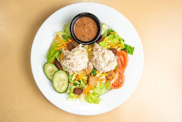Nature's Garden Tuna Salad  · A fresh mix of lettuce, tomato, two-cheese blend, cucumbers, carrots, and crunchy croutons topped with Tuna Salad. Served with your choice of dressing.