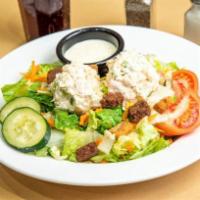 Nature's Garden Chicken Salad · A fresh mix of lettuce, tomato, two-cheese blend, cucumbers, carrots, and crunchy croutons t...