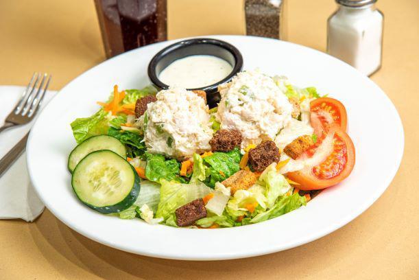 Nature's Garden Chicken Salad · A fresh mix of lettuce, tomato, two-cheese blend, cucumbers, carrots, and crunchy croutons topped with Chicken Salad. Served with your choice of dressing.