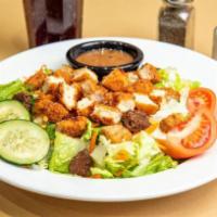 Nature's Garden Crispy Chicken Salad · A fresh mix of lettuce, tomato, two-cheese blend, cucumbers, carrots, and crunchy croutons t...