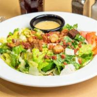 Caesar's Empire Salad · Crisp romaine, tossed in our Caesar dressing with croutons, tomato, shredded Parmesan cheese...