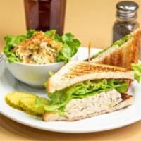 Tuna Salad Sandwich · Creamy tuna salad topped with crisp lettuce.
