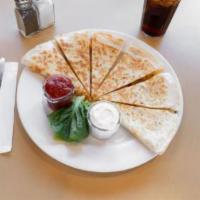 Cheese Quesadilla · A warm white or wheat tortilla with melted cheese, crisp bacon, scallions and tomato. Served...