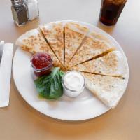 Chicken Quesadilla · A warm white or wheat tortilla with filled with juicy chicken, melted cheese, crisp bacon, s...