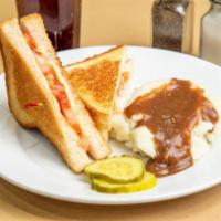 Grilled Cheese with Tomato · A classic grilled cheese with American Cheese, Tomato and White Bread; grilled to perfection. 