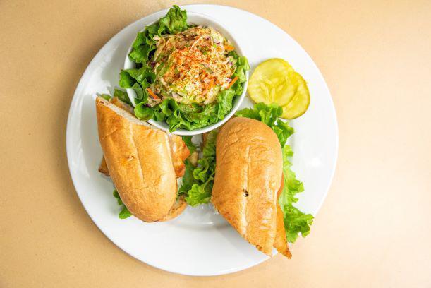 New Englander Fish Sandwich · Golden fried fish served with lettuce and tomato on a grilled Deli Sub Roll. 