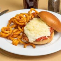 Chicken Parmesan Sandwich · Breaded and juicy fried chicken breast topped with marinara sauce and served on a fresh brio...