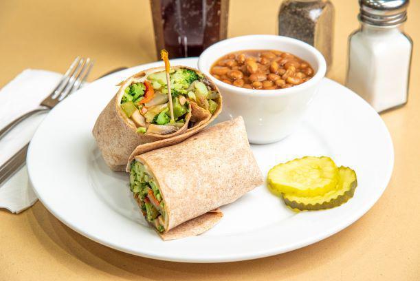 Veggie Wrap · Crisp broccoli, grilled peppers and onion, sauteed mushrooms and melted cheese fill this delicious wheat wrap.