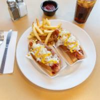 2 Creamery Dog Special · Two hot dogs with onion, mustard, Newport's creamery's own red pepper relish and sauerkraut.