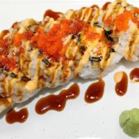 Double Dragon  · Lightly fried tuna and salmon inside, topped with flying fish roe, eel sauce, mayo, scallion 