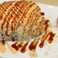 Crunch Spicy Salmon Roll · Spicy salmon, cucumber, topped with crunch, chef sauce.