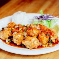 General Sweet and Sour Chicken · Chunks of chicken deep-fried in batter then stirred with oriental sweet and sour sauce.