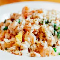Chicken & Shrimp Fried Rice · Pan fried rice with Shrimp, chicken, vegetables, and egg.
Serve with yummy yummy sauce.