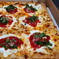 Grandma Pizza · Square, 16', thin crust pizza, with tomato sauce, fresh mozzarella cheese and basil. 