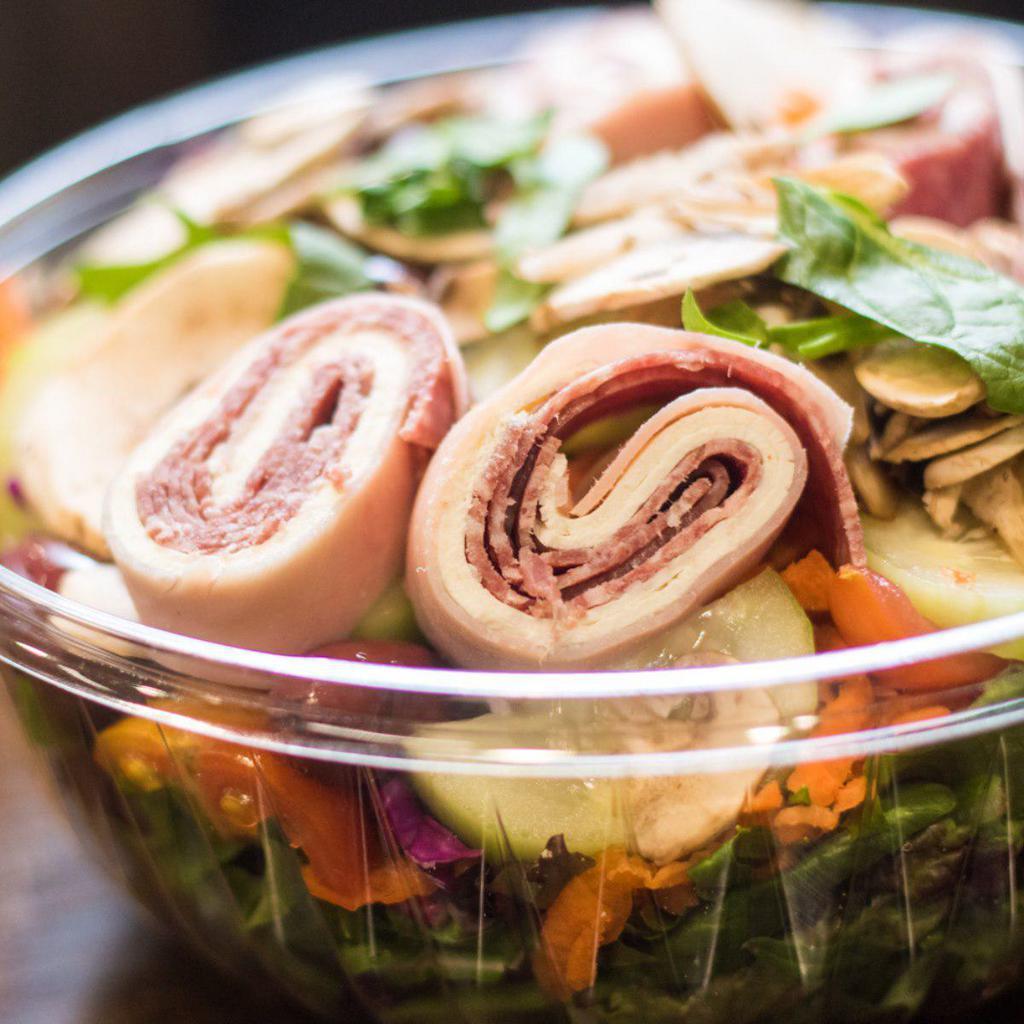 Antipasto Salad · Garden salad with ham, salami, capicola, mushrooms, black olives, and mozzarella. 240 calories.