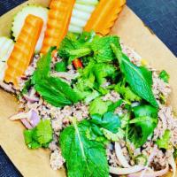 6. Larb Salad · Choice of grounded chicken, beef or pork, mixed with red and green onion, cilantro and roast...