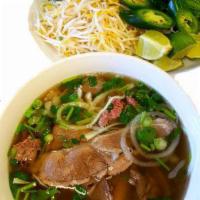 Pho Dac Biet - House Special Beef Noodle Soup · Rare beef, flank, brisket, tendon, stripe, and meatball. Fresh rice noodle, beef, or chicken...