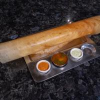 Cheese Masala Dosai · Rice and lentil crepe filled with potatoes and peas masala and cheese served with sambar, co...