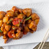 13. Sweet and Sour Chicken · Red pepper, green pepper and pineapple. Served with choice of rice.