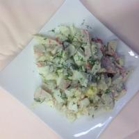 Crab Salad · Crab meat, cucumber, boiled eggs and mayonnaise.